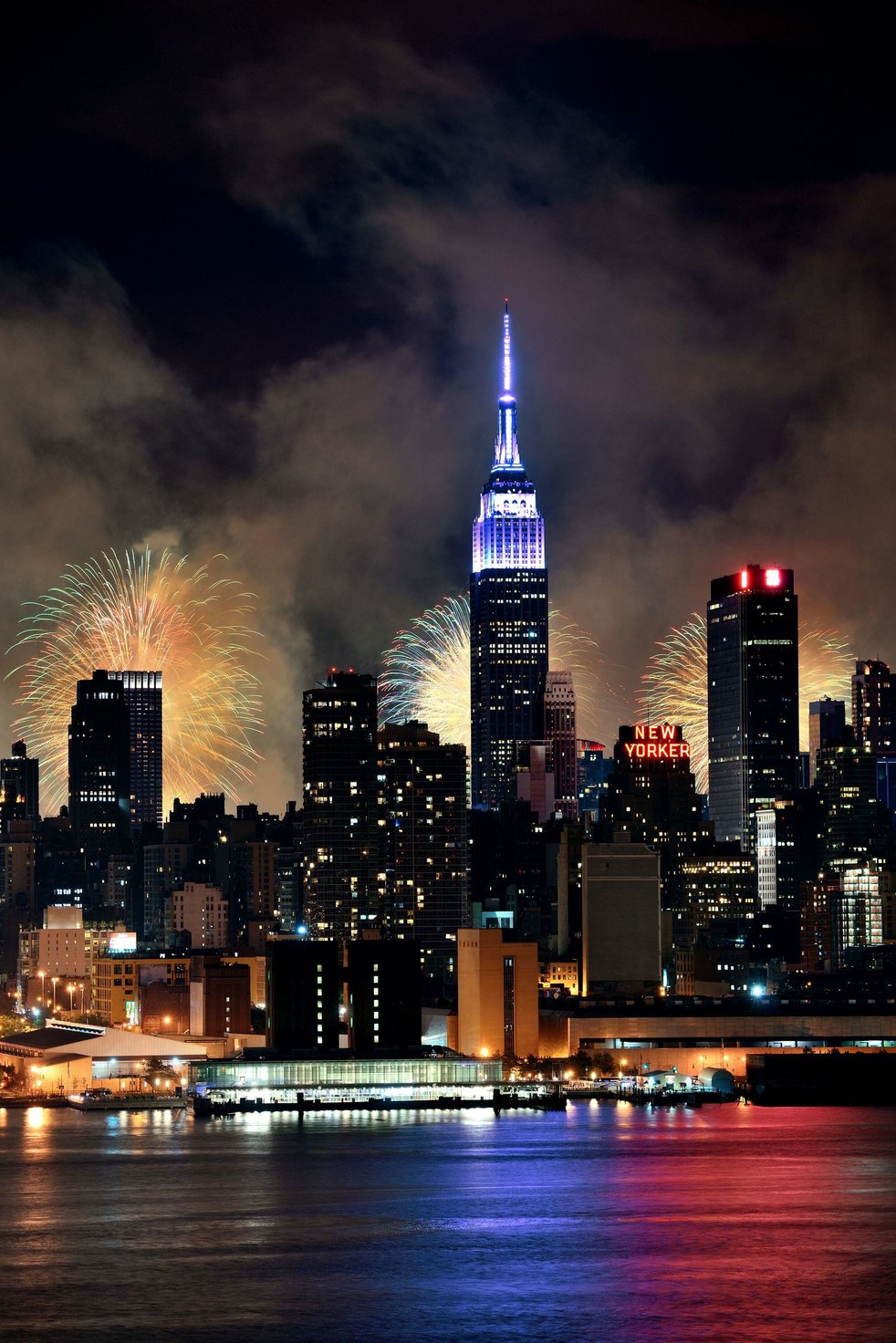 Concorde Hotel rooftop NYC skyline during 4th of July fireworks.