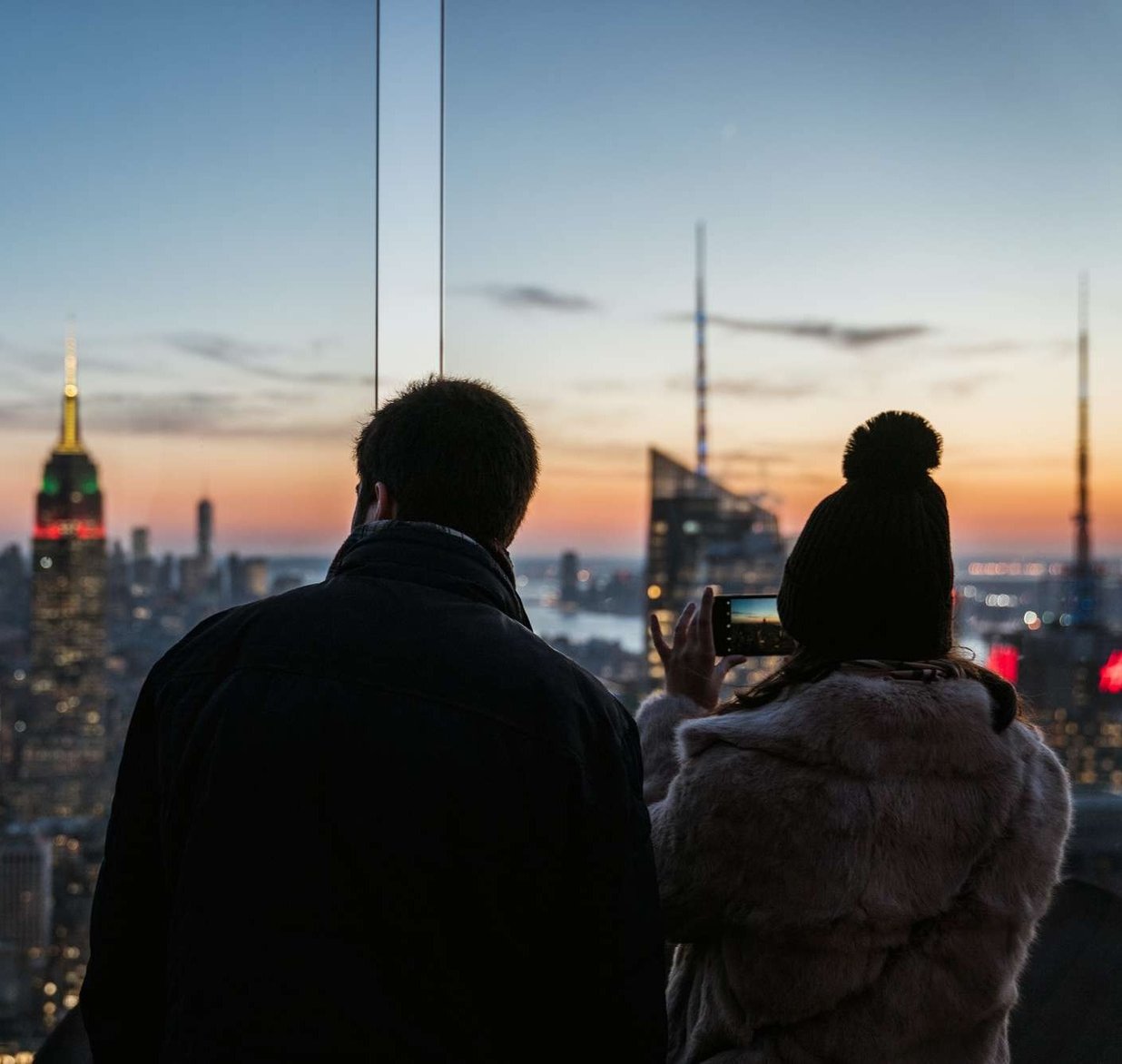 Elegant honeymoon suite in a luxury New York City hotel with city views.