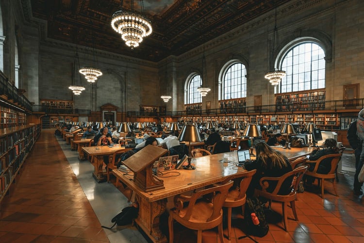 People are studying inside of the New york public library