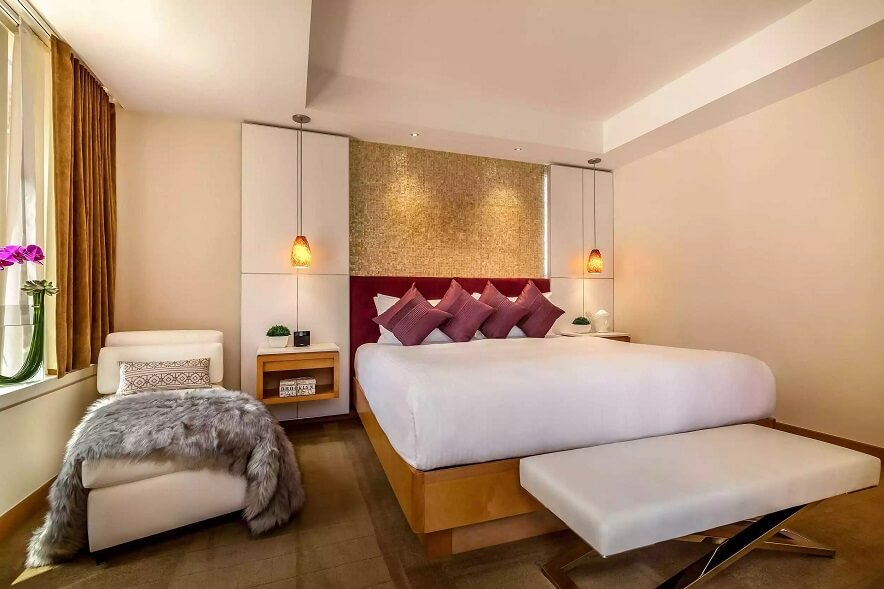 One-bedroom-suite-with-terrace-bedroom-Concorde-hotel-1 (resized) (min)