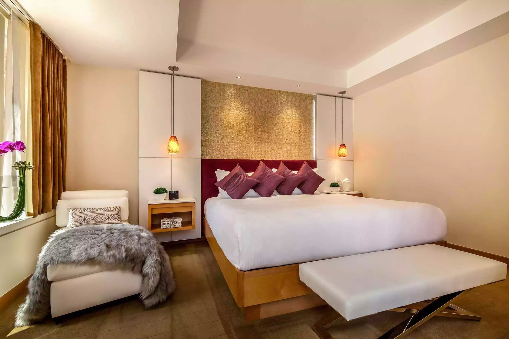 One-bedroom-suite-with-terrace-bedroom-Concorde-hotel-1